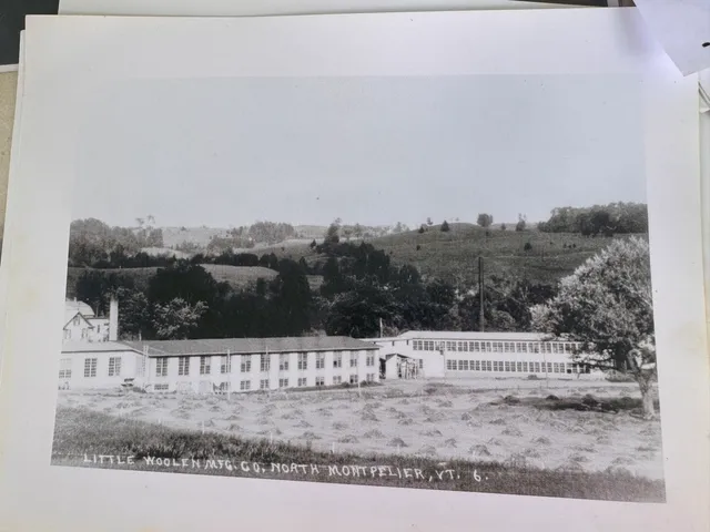 Black-and-white postcard of the Little Woolen Mfg. Co. mill complex in North Montpelier, Vermont.